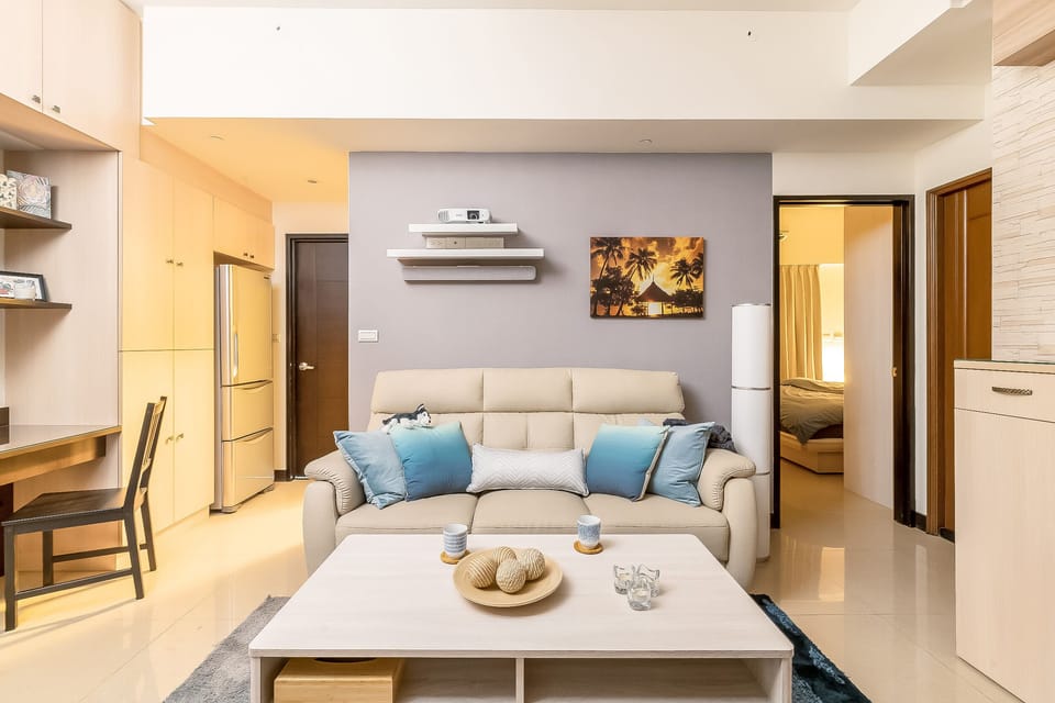 Living Room: 
• Projector & Screen
• Cinema Experience 
• Designated Workspace