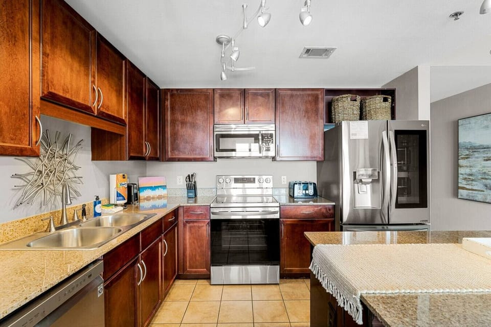 Fully Stocked Kitchen with Ocean Views and Island Bar Seating