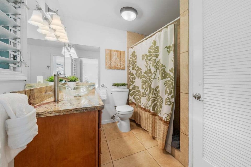 Refresh in this spacious bathroom featuring a walk-in shower