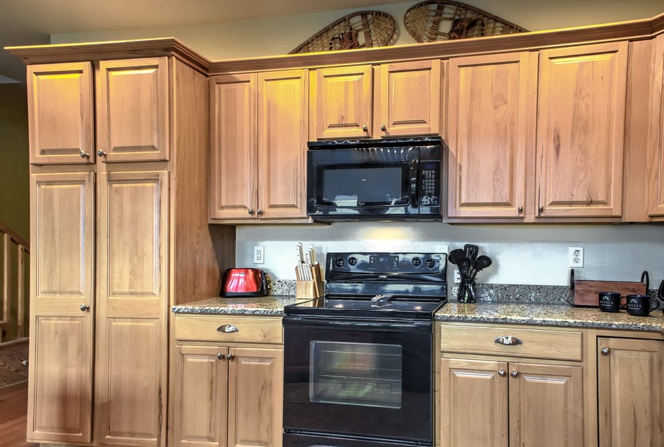 Kitchen is equipped with Electric Range