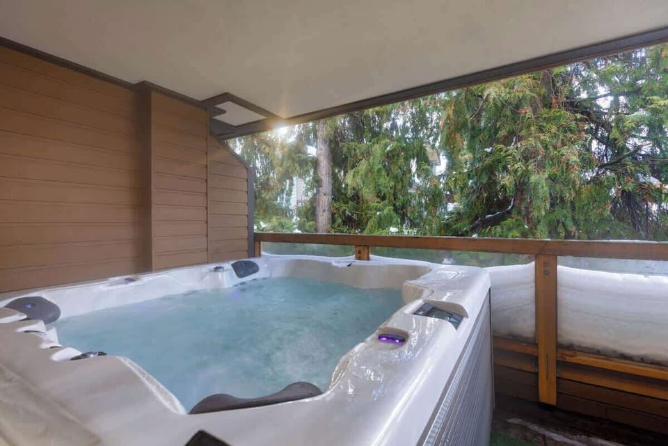 - Unwind in your private hot tub surrounded by evergreens  
- Relax tired muscles after a day of skiing or hiking  
- Serene forest views add the perfect peaceful touch  
