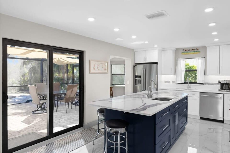 Gorgeous kitchen with marble island and open layout