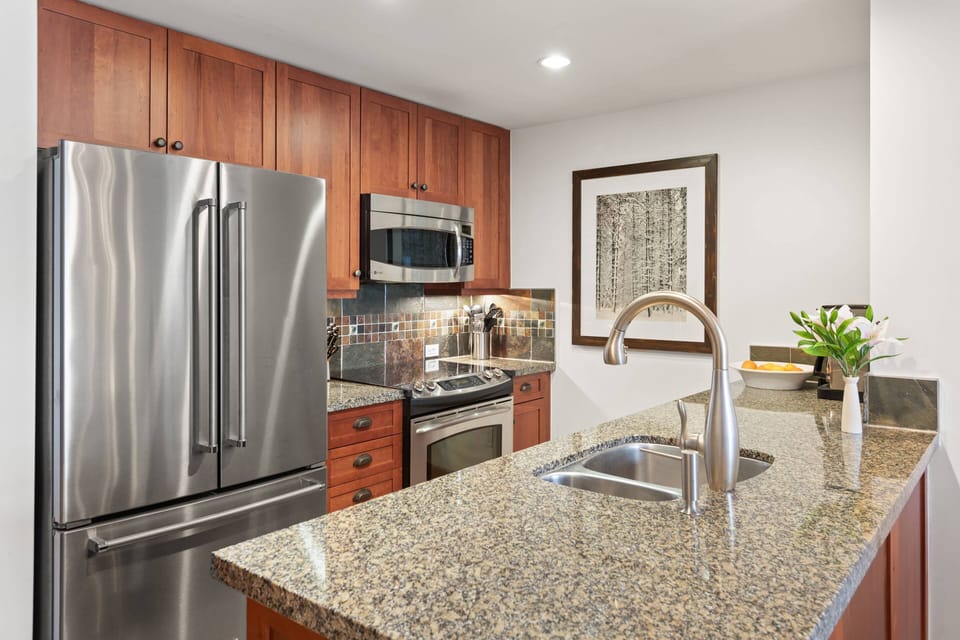 The kitchen is fully stocked with everything you need to enjoy dining at home during your vacation in Snowmass