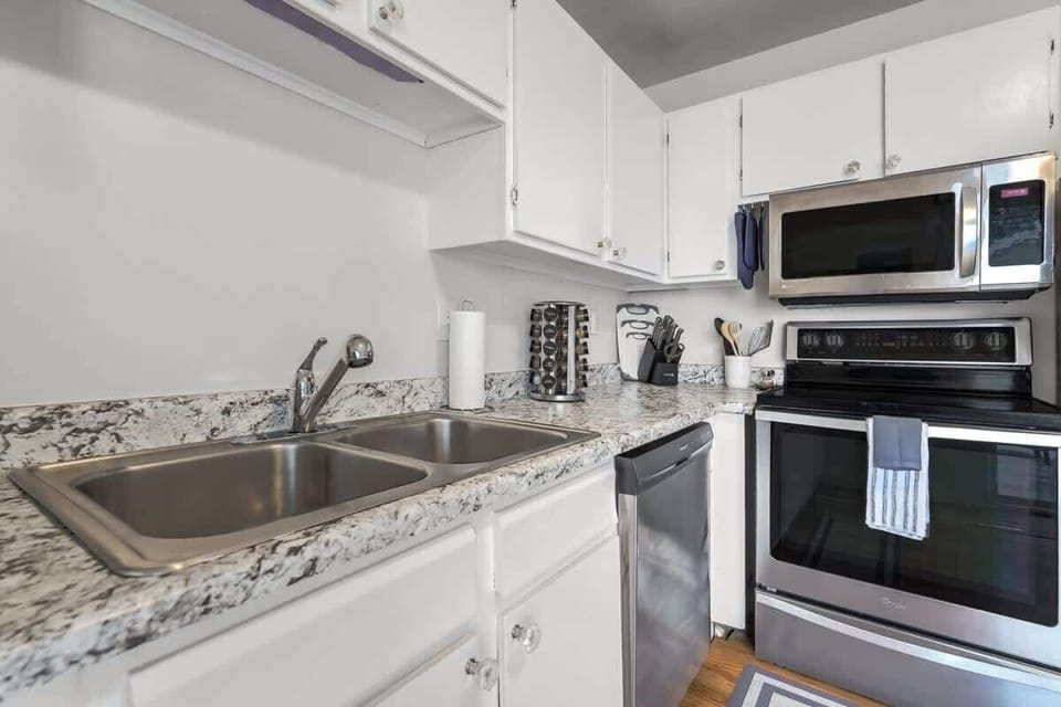 Kitchen Convenience! Our modern, fully equipped kitchen is designed with your comfort and convenience in mind. Whip up delicious meals with ease!