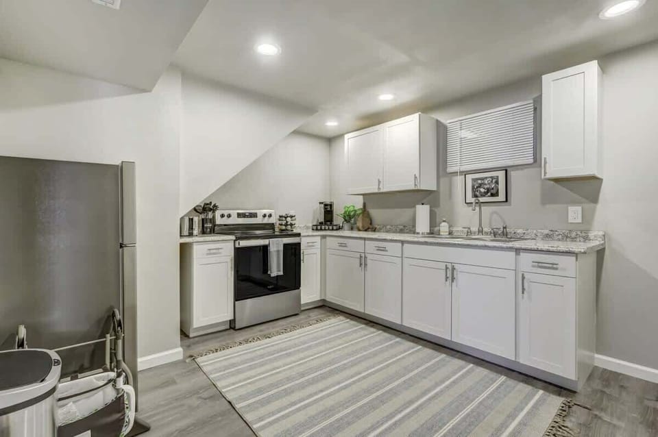 Whip up your favorite meals in our spacious kitchen! Because no vacation is complete on an empty stomach. Enjoy the convenience of a comfortable kitchen right next to the dining area.