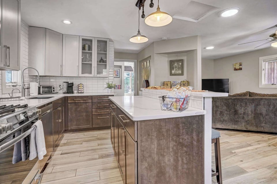 Cook and connect in this open-concept kitchen with a spacious island perfect for meal prep and gatherings.