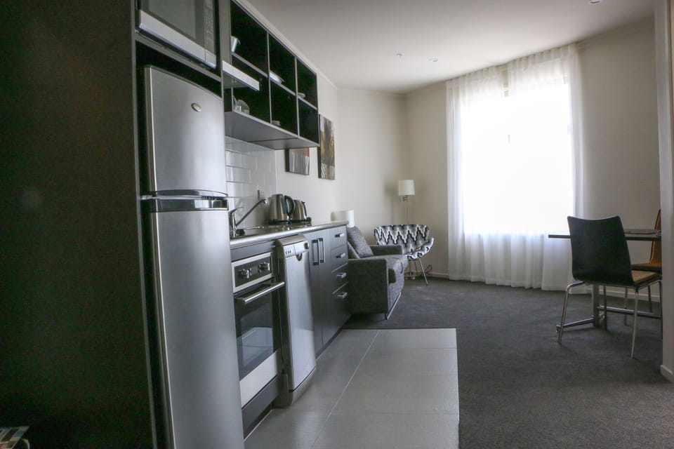 One Bedroom Apartment | Private kitchen | Fridge, microwave, stovetop, coffee/tea maker