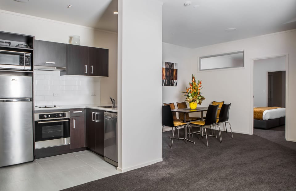 Apartment, 2 Bedrooms | Private kitchen | Fridge, microwave, stovetop, coffee/tea maker