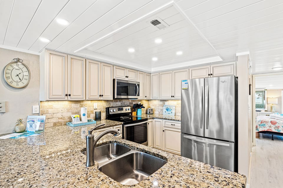 Townhome, Multiple Beds, Balcony, Ocean View (22519 Front Beach Road 150) | Private kitchen | Fridge, microwave, oven, stovetop