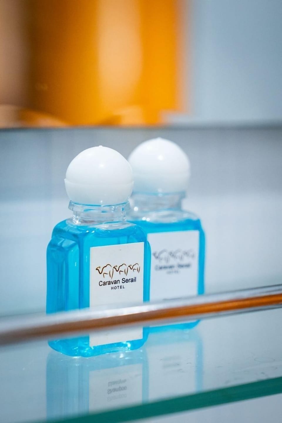 Shower, hair dryer, slippers, towels