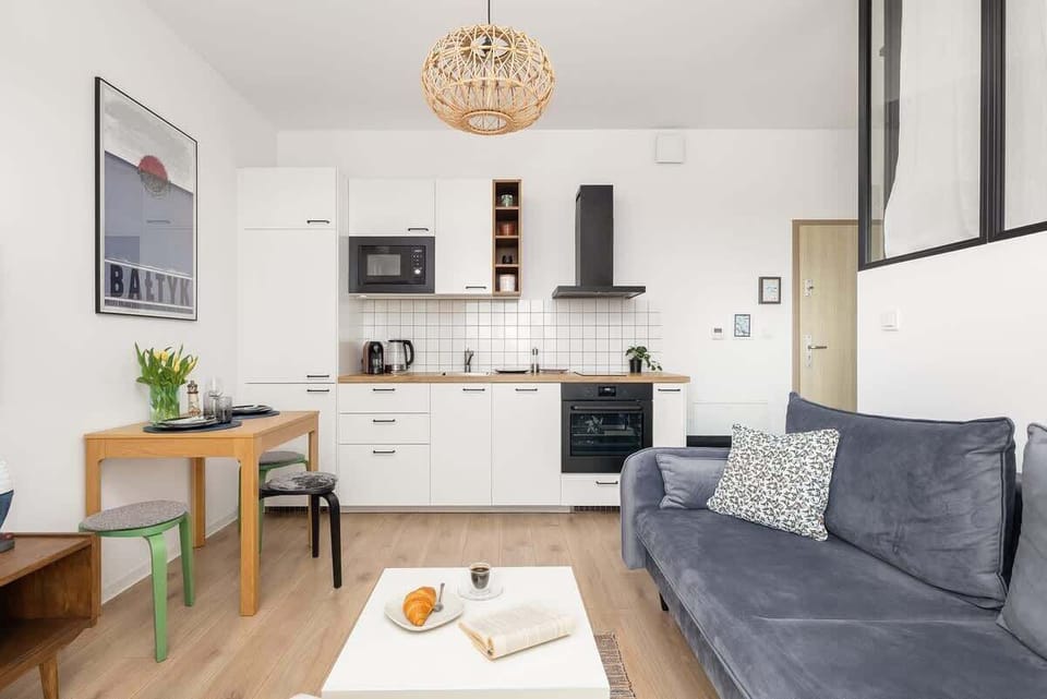 A closer look at the open kitchen and living area, emphasizing the modern yet cozy design.

