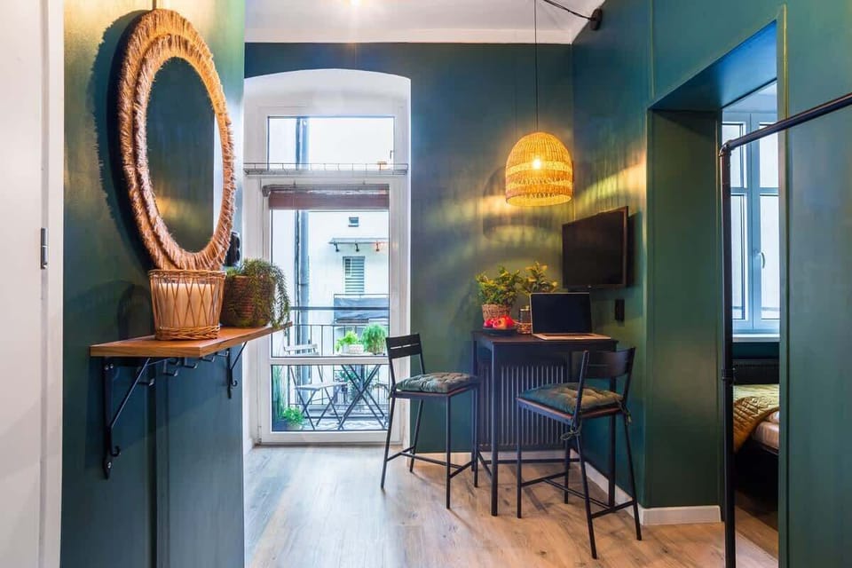 A full view of the stylish interior, showcasing the living and dining areas.

