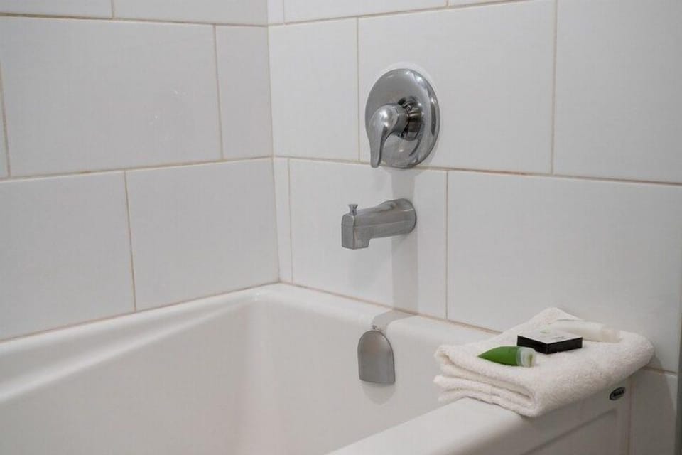 Freshen up in the bathroom after a day of adventure.