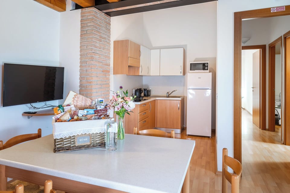 Family Apartment, 2 Bedrooms | Private kitchenette | Fridge, microwave, coffee/tea maker, electric kettle