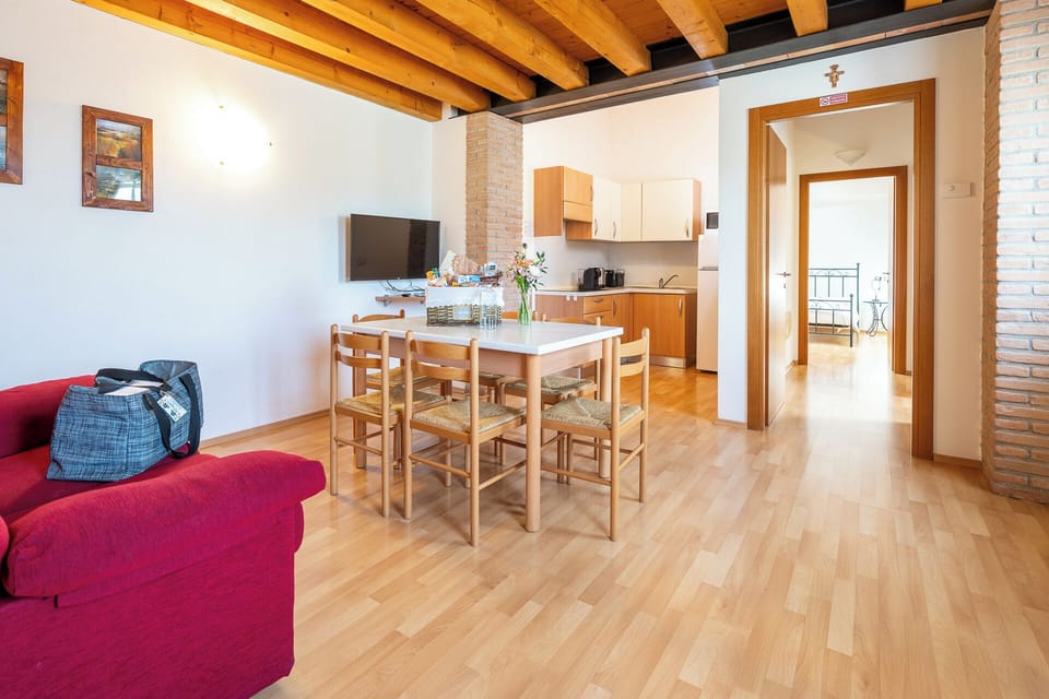 Family Apartment, 2 Bedrooms | Living area | 26-inch flat-screen TV with satellite channels, TV