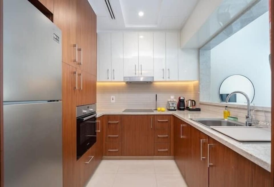 Luxury Apartment | Private kitchen | Full-size fridge, microwave, oven, stovetop