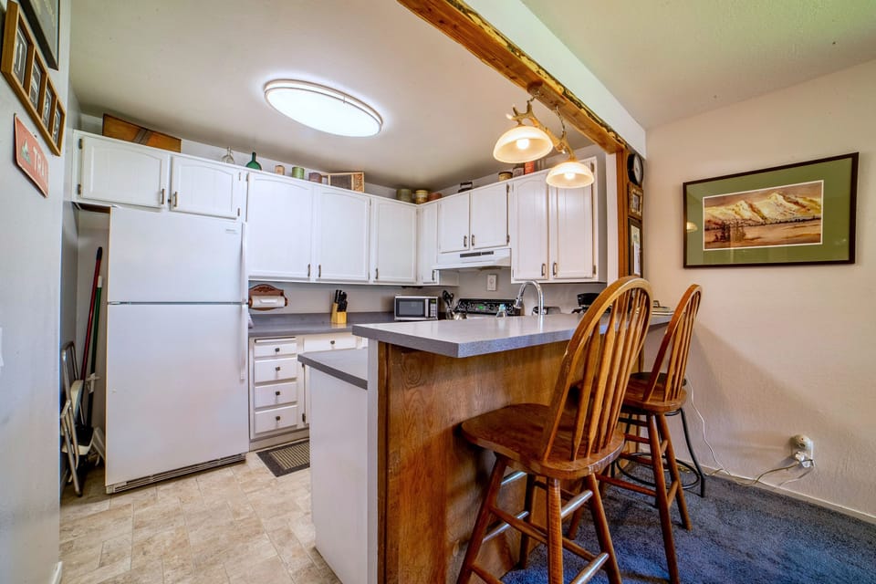 Updated kitchen with bar seating.