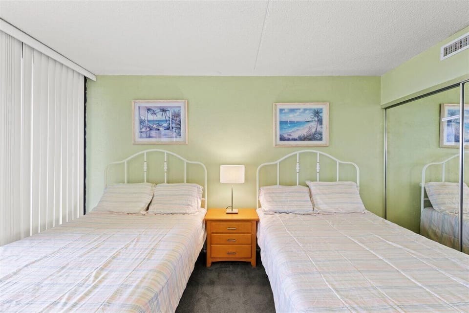 Melt into the Comfy Full Beds after a long day at the Beach!