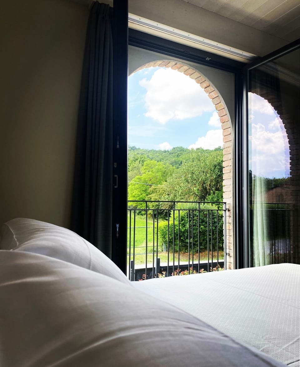 Room | Premium bedding, down comforters, in-room safe, desk