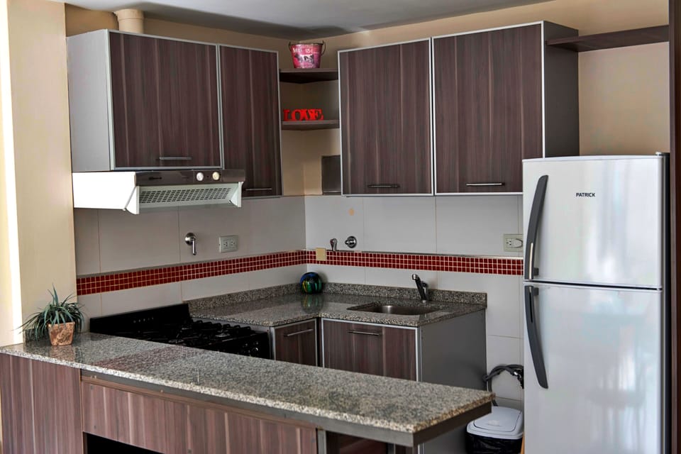 Family Apartment | Private kitchen | Full-size fridge, coffee/tea maker, cookware/dishes/utensils