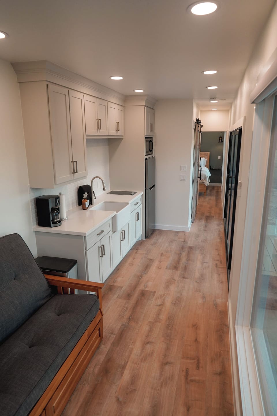 Container 1: Kitchen with coffee machine, fridge, and microwave included