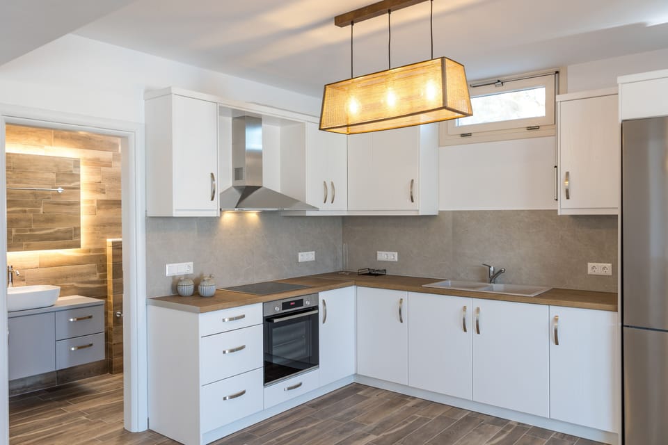 Deluxe Suite, Private Pool, Sea View | Private kitchen | Full-size fridge, oven, espresso maker, coffee/tea maker