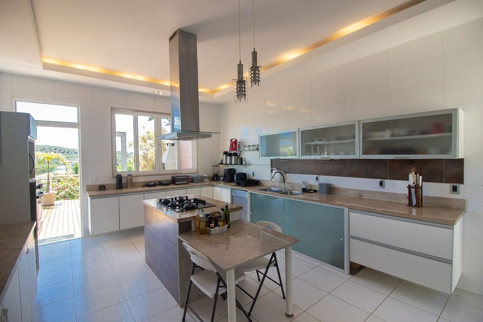 Villa | Private kitchen | Fridge, microwave, oven, toaster