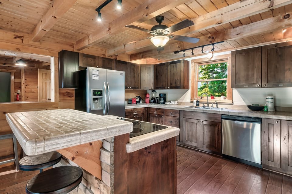 two cooktops and an oven and dishwasher.