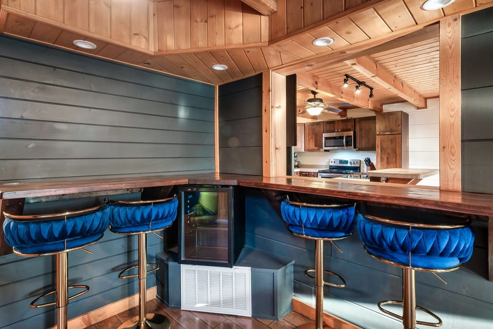 Sit at the bar while you're playing pool