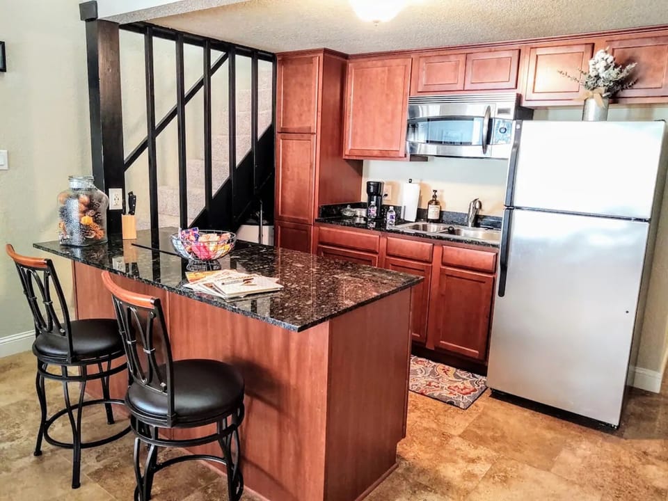 Comfort Condo | Private kitchen | Full-size fridge, microwave, stovetop, dishwasher