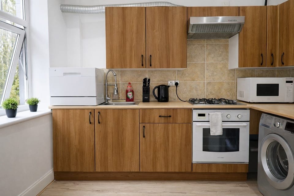 Family Apartment | Private kitchen | Fridge, microwave, oven, toaster