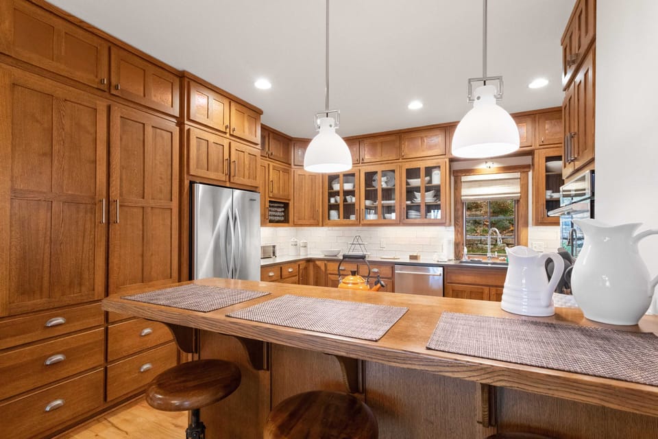 Fully Stocked Kitchen with Preparation Space and Serving Essentials