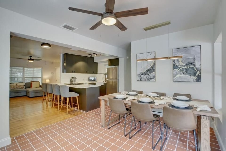 A fully stocked kitchen with ample seating invites culinary creations and shared meals.