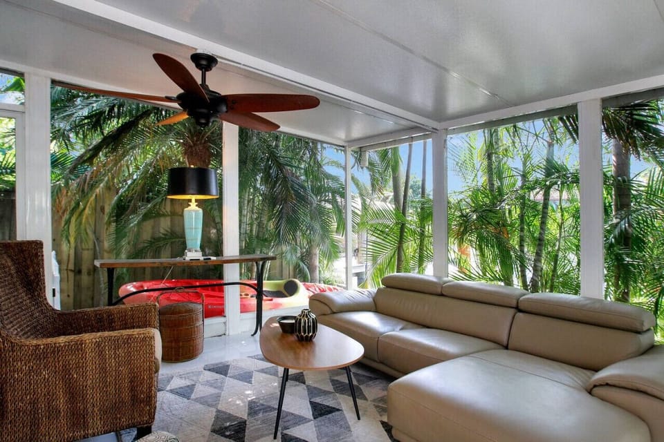 This living room seamlessly blending the beauty of the indoors with the splendor of the outdoors.