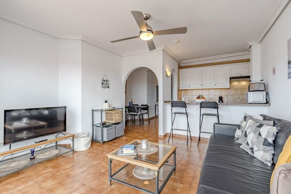 Living Room with Sitting, Bar & Dining Area, TV, Ceiling Fan & Views