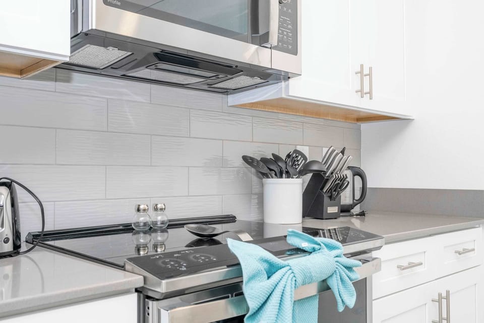 Stay connected with family while preparing meals in this bright, open kitchen that flows seamlessly into the dining and living areas
