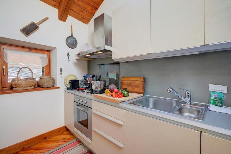 Standard Apartment, Multiple Bedrooms, Mountainside (Romito Lodge Apartment Mountain) | Private kitchen | Fridge, oven, stovetop, dishwasher