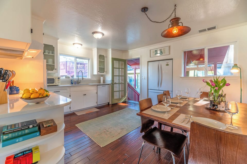 The kitchen and dining room are next to the living room