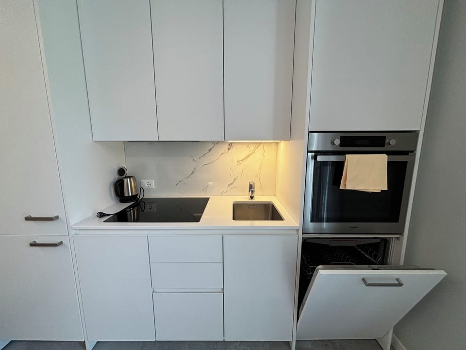 Family Condo | Private kitchen | Full-size fridge, oven, stovetop, dishwasher