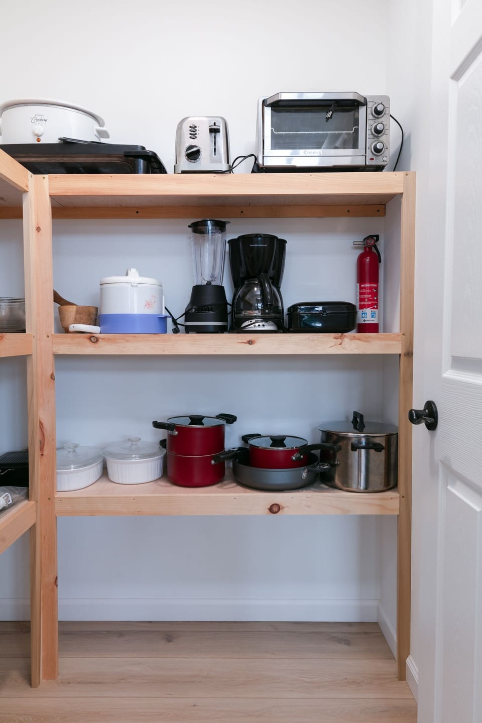 Stocked Pantry includes rice cooker, blender, toaster, mixer, pots, pans, mixing bowls, crockpot.