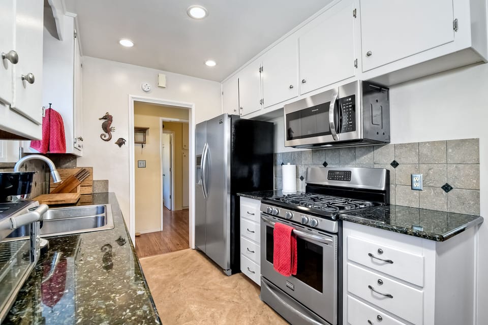 Galley kitchen with all modern appliances