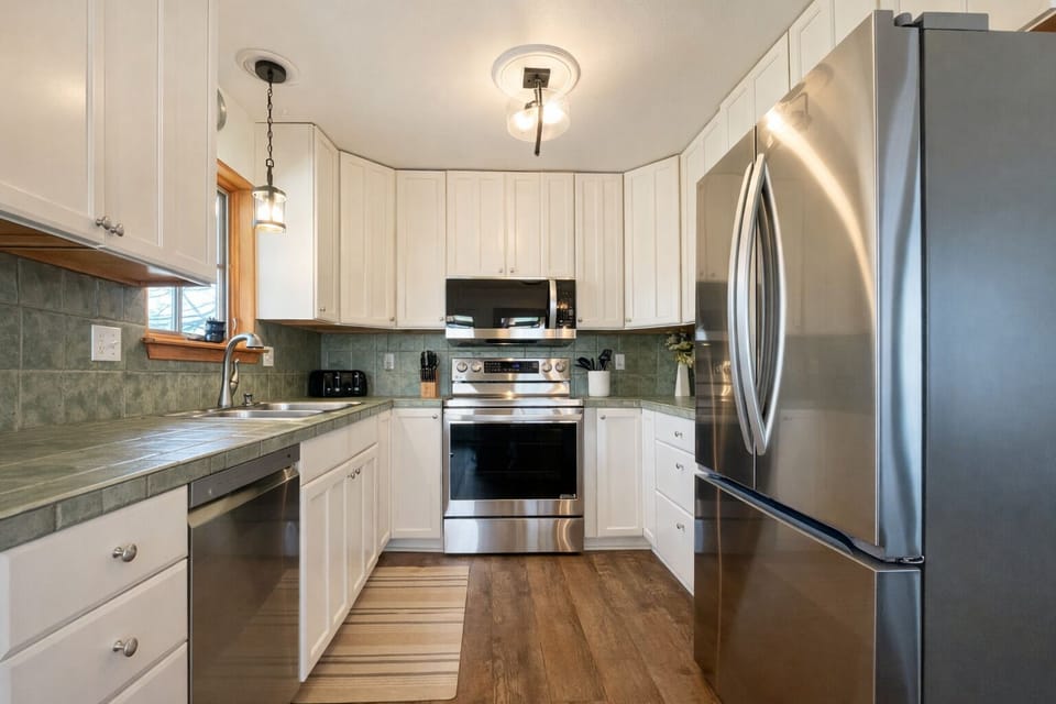 Kitchen with Stainless Steel Appliances | Enjoy home cooked meals during your stay!