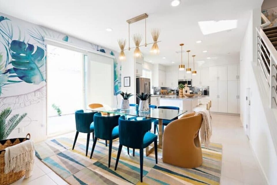 Living/dining room and kitchen, open concept with sliding glass doors to patio.