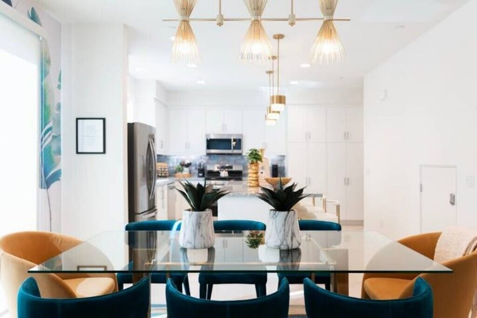 Living/dining room and kitchen, open concept with sliding glass doors to patio.