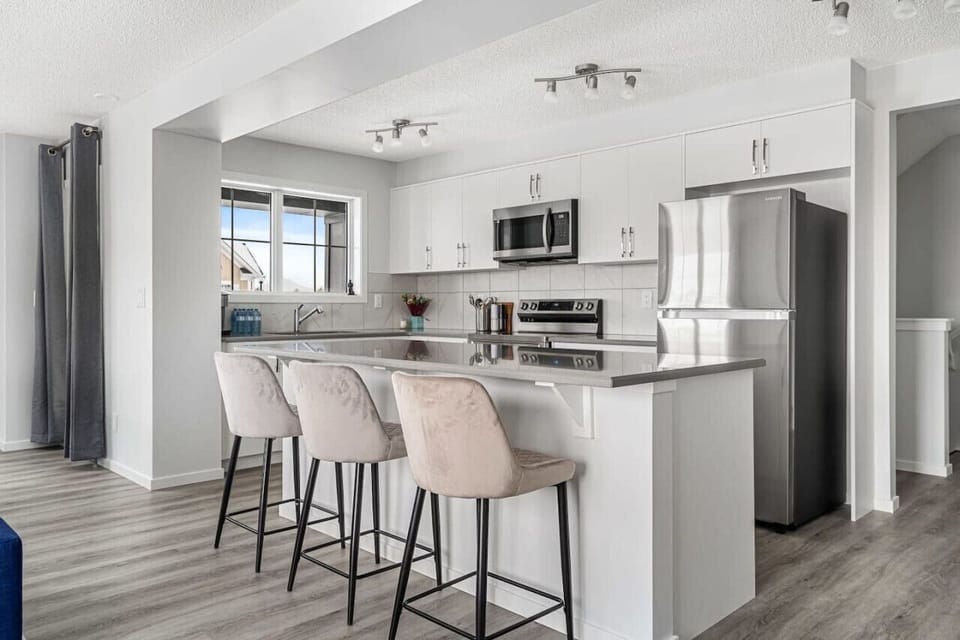 Kitchen island with 3 bar-stools