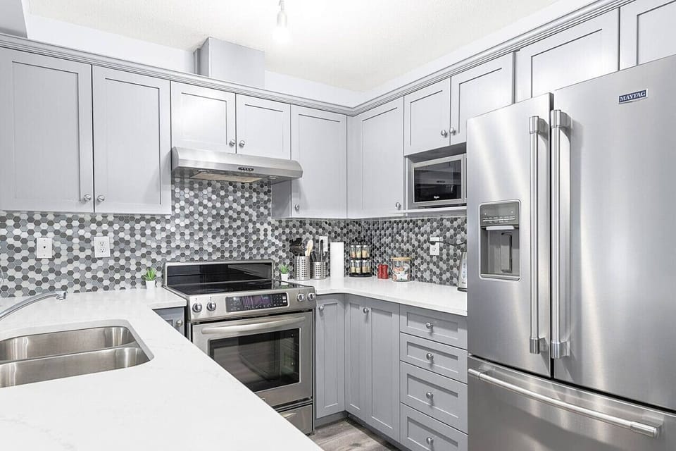 Whip up a feast in our fully-equipped kitchen, boasting a spice rack, ice maker, modern appliances, and a coffee machine for your morning brew.