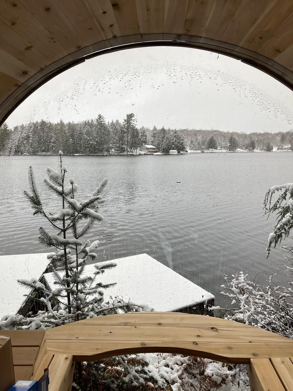 Panoramic barrel sauna with a open lake view