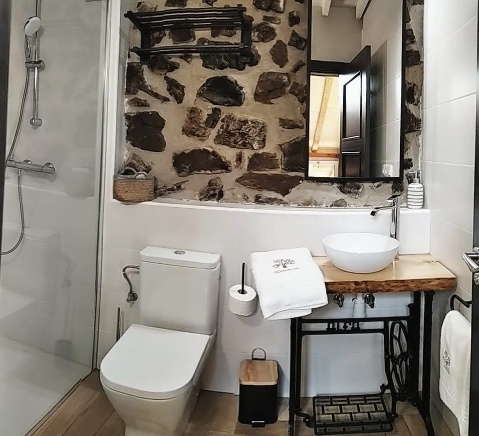 Exclusive Room, 1 King Bed | Bathroom | Hair dryer, towels, soap, toilet paper