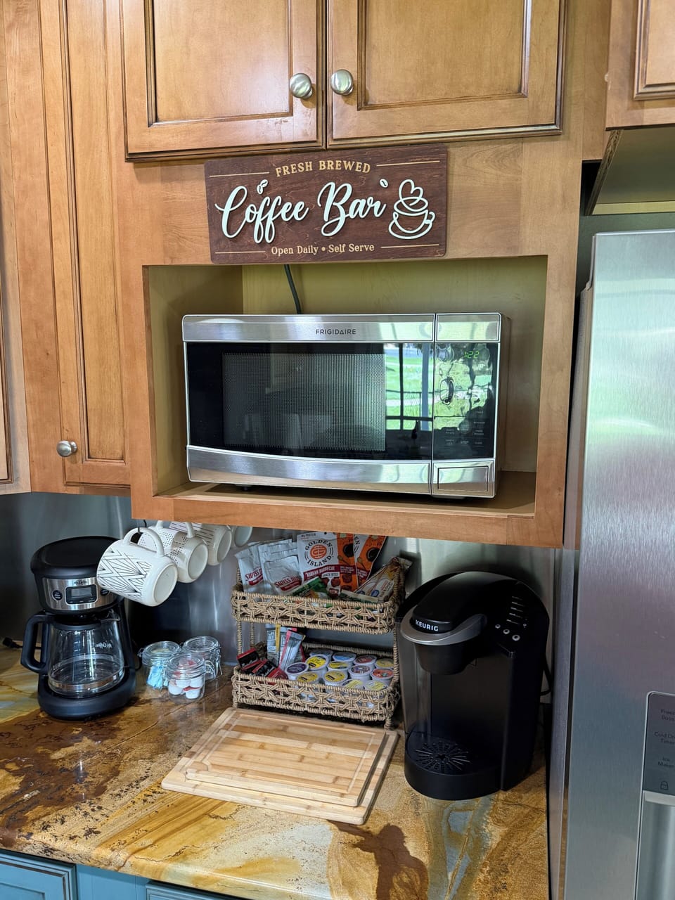 Fully stocked coffee bar with complimentary supplies for coffee, tea and hot cho