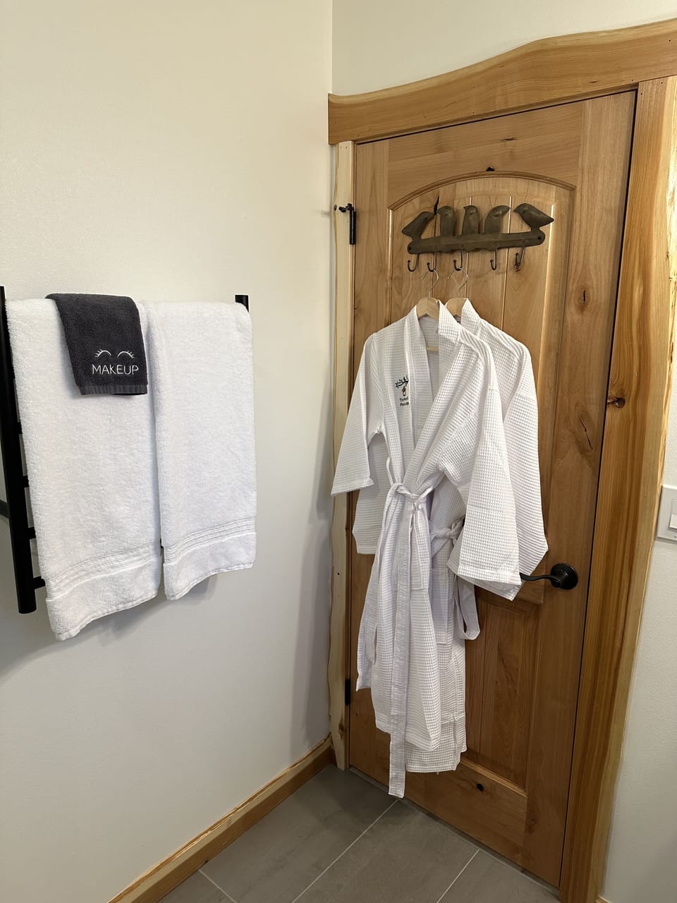 Heated towel rack and robes provided